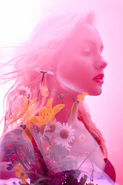 Woman with flowers inside, double exposure. Blonde