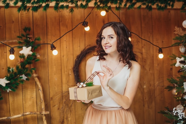 Woman with gift on christmas day