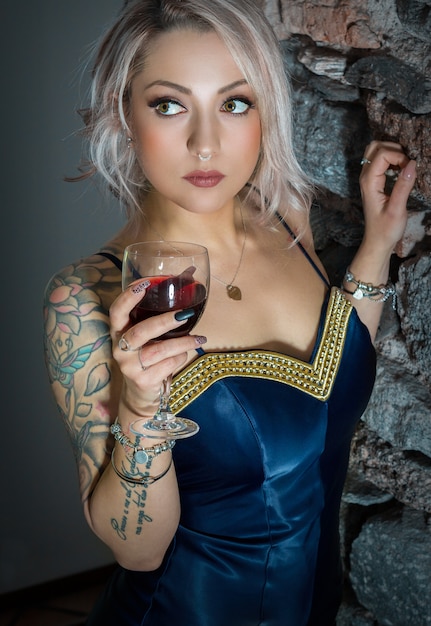 A woman with a glass of red wine