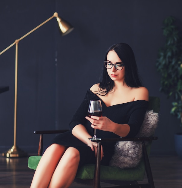  woman with glass of wine