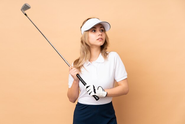 Woman with a golf club