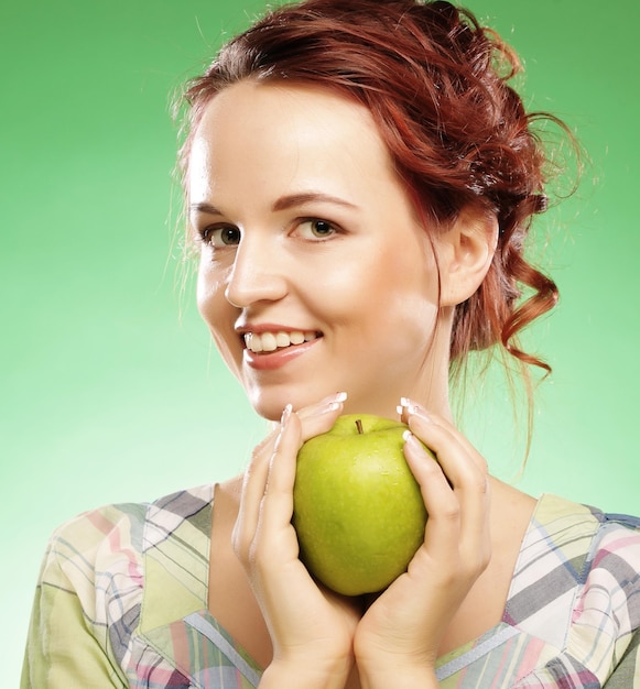 Woman with green apple