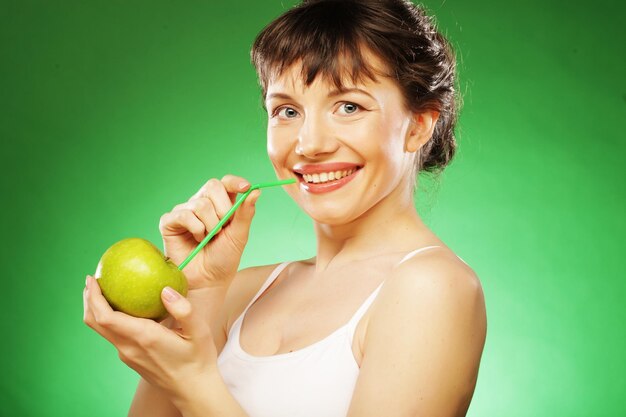 Woman with green apple