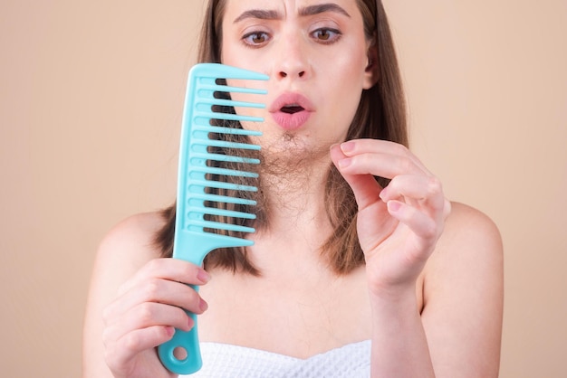 Woman with hair problem woman is looking shocked to her lost hair head bald and hair treatment conce