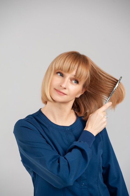 Woman with hairbrushes on background. Doctor