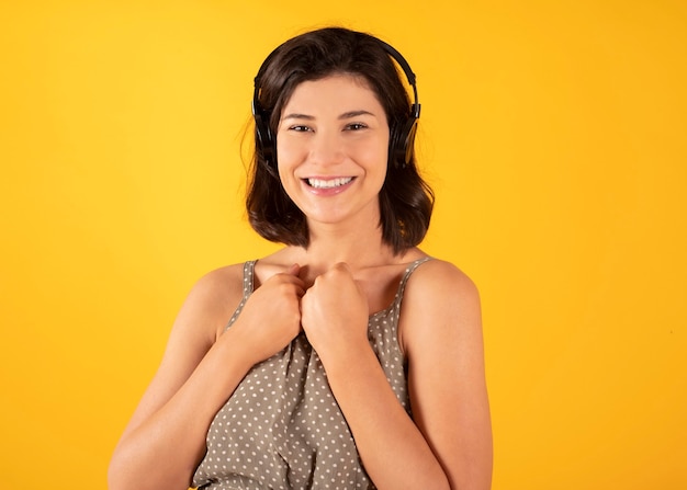 Woman with headphones listening to music