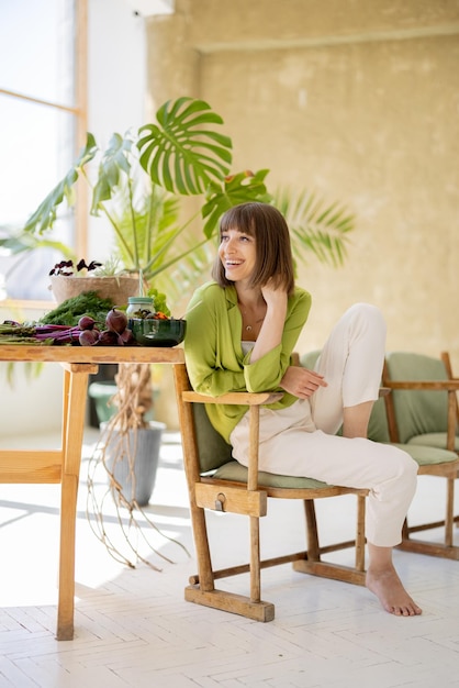 Woman with healthy food indoors