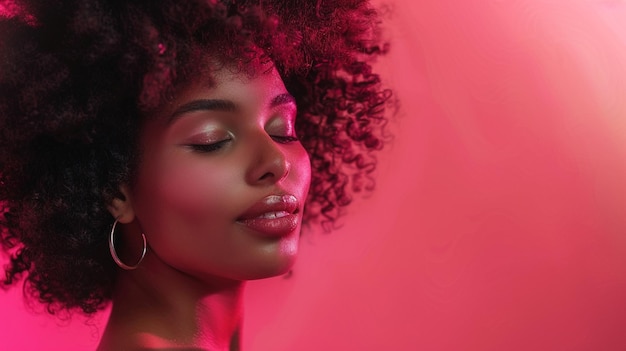 a woman with her eyes closed and a pink light behind her