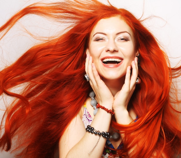 Woman with long flowing red hair