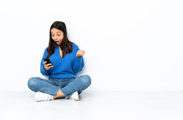 woman with mobile and sending a message