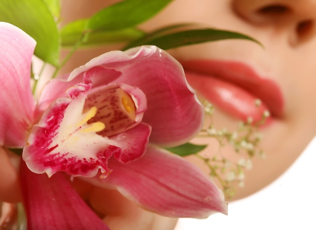 Woman with orchid flower