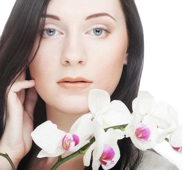 Woman with orchid flower