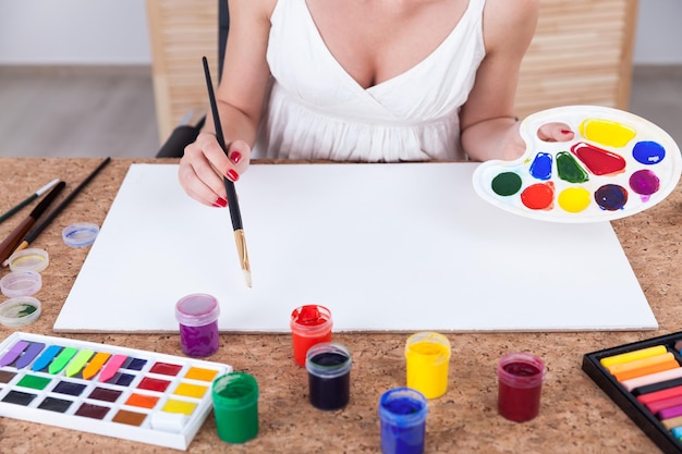 Woman with palette and brush