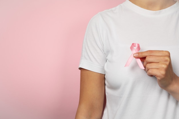 Woman with pink awareness ribbon