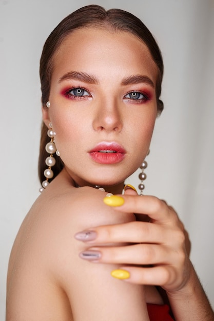 woman with professional makeup looking at camera