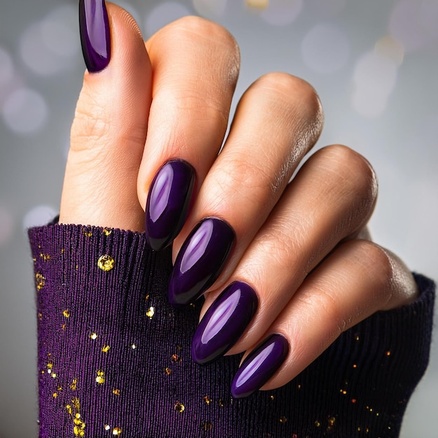 a woman with purple nails that has purple nails