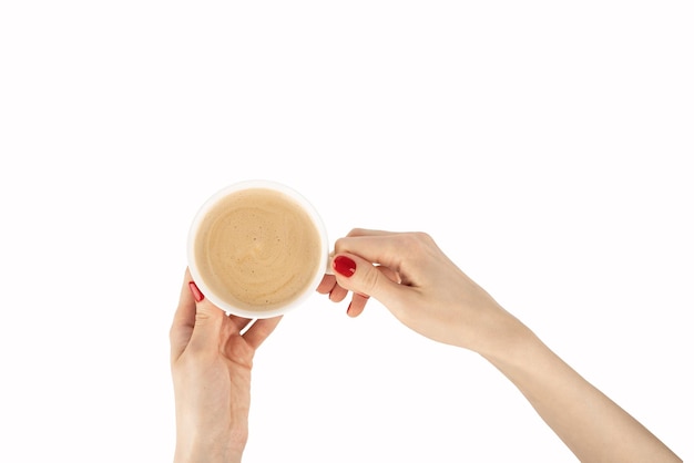 Woman with red manicure holding a white coffee cup isolated on a white background with clipping path