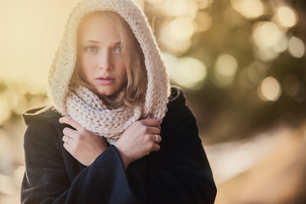 Woman with a scarf by the head