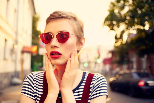 Woman with short hair wearing sunglasses outdoors romance High quality photo