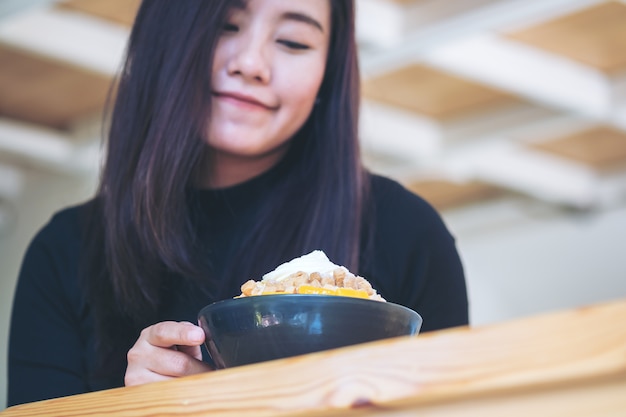 Woman with sweet dessert