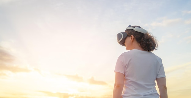 Woman with VR virtual reality goggles