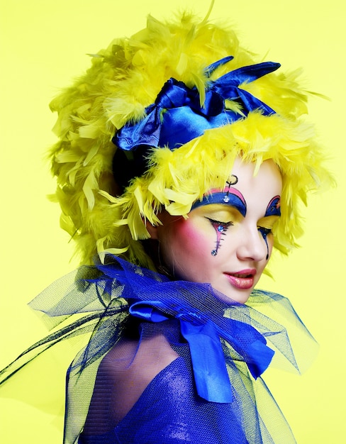 Woman with yellow wig feather