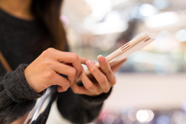 Woman wokring on mobile phone