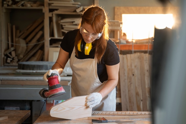 Woman working in atelier medium shot