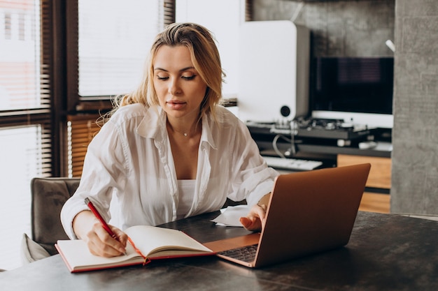 Woman working from home on laptop