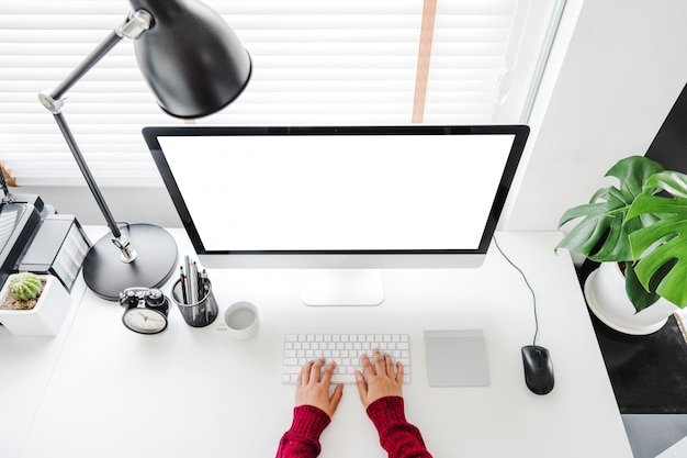 woman working from home using computer