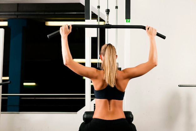 Woman working out in gym