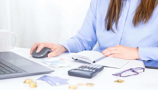 Woman works at the computer Deadlines at the end of the month taxes