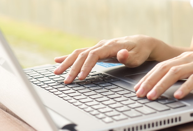 Woman works on computer.