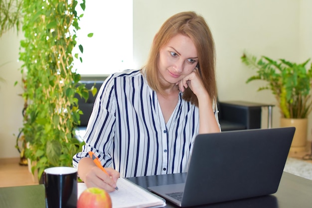 woman works remotely from home remote positive worker