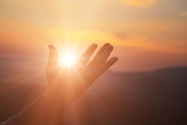 Woman worship on sunset