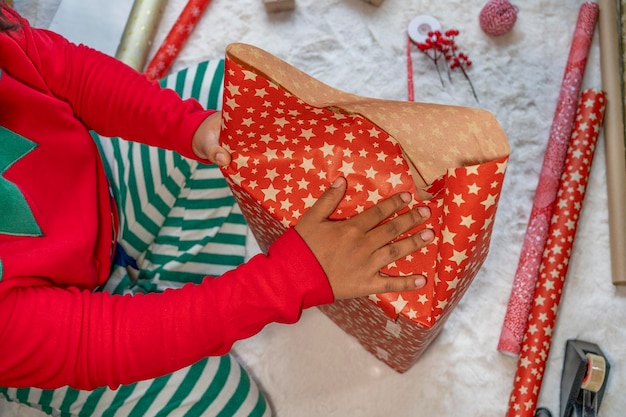 Woman wrapping christmas presents