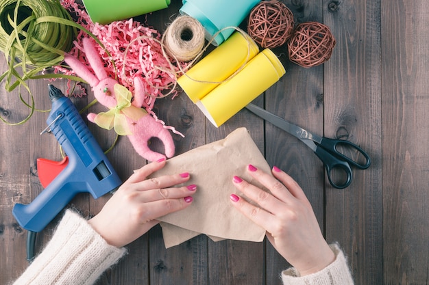 Woman wraps gift