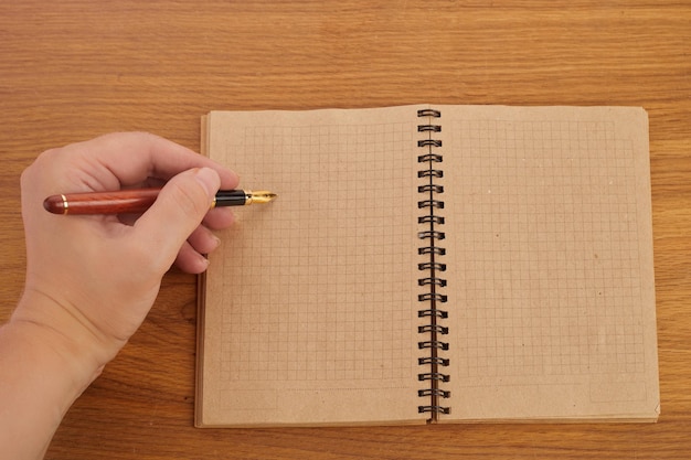 Woman writing by left hand left hander day concept