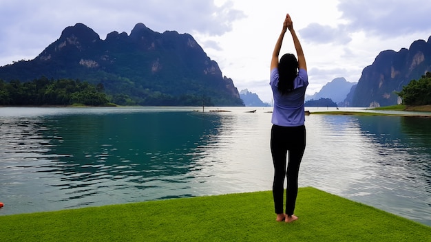 Woman Yoga - relax in nature.