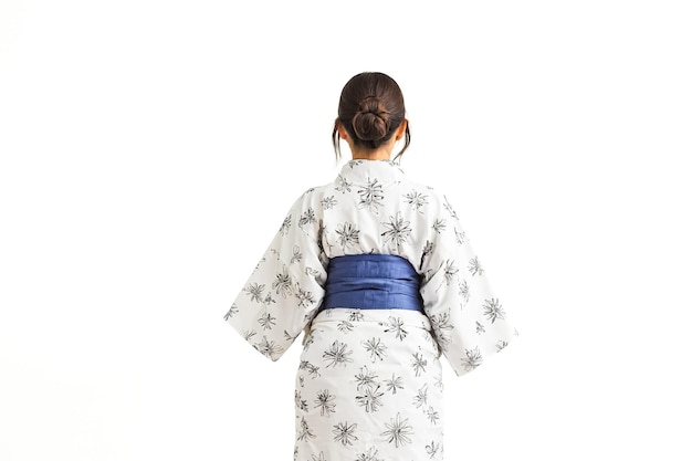 Photo woman in yukata facing away from camera