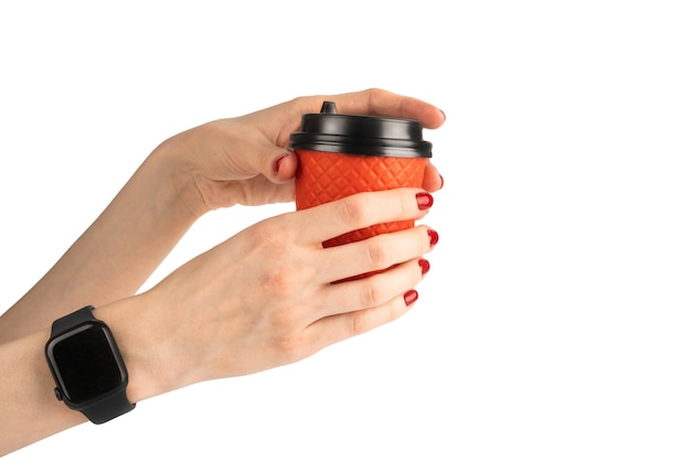 Woman39s hand holding red paper cup of coffee for take away Drink start of the day morning concept