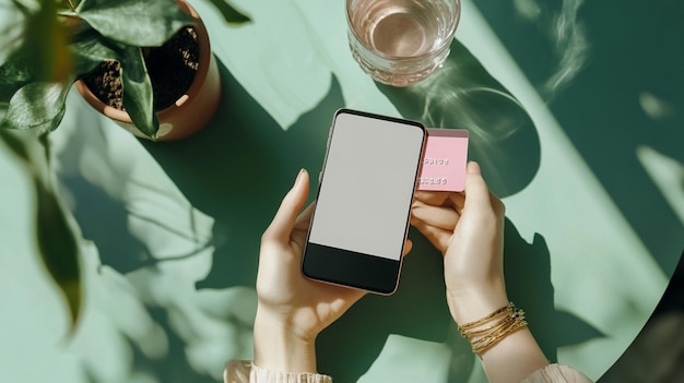 Photo a womans hand holds a smartphone with a blank screen