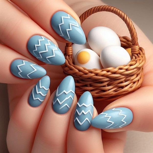 a womans hand with blue nail polish and blue nail polish