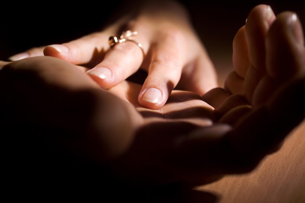 Womans hands with a ring