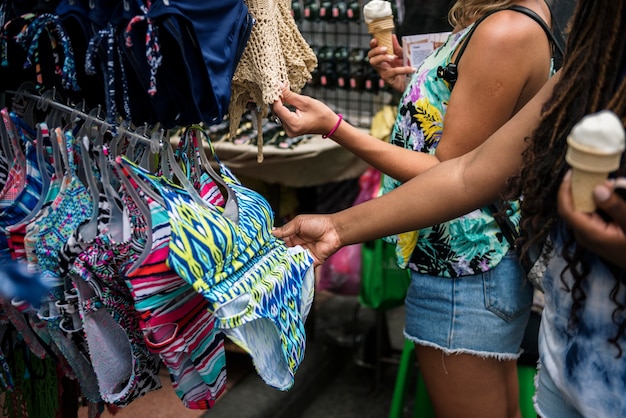 Women choosing bikini swimwear