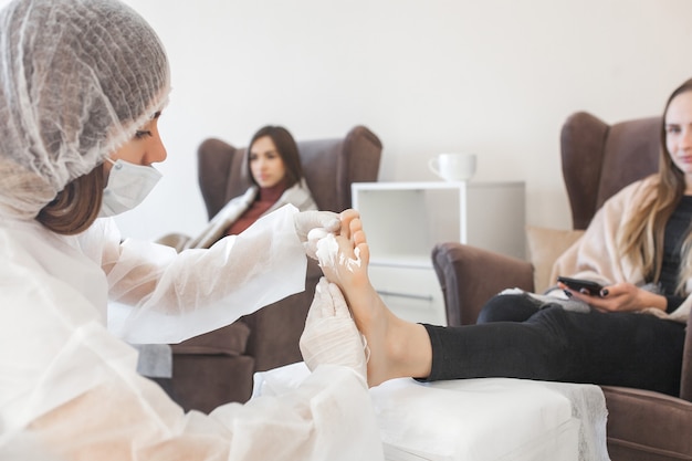 Women in a cosmetic salon doing treatment