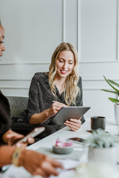 Women coworkers working together