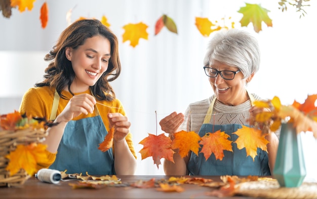 Women doing autumn decor