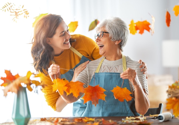 Women doing autumn decor