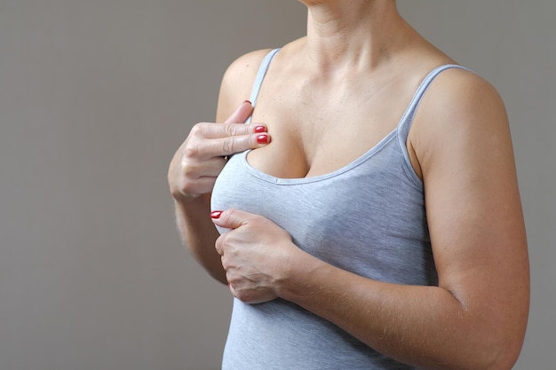 Women doing selfchecks for breast cancer